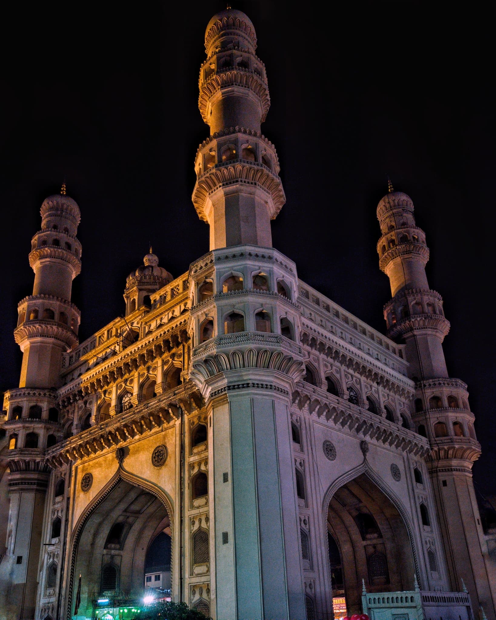 The Charminar lit against a night sky, Hyderabad, Telangana
