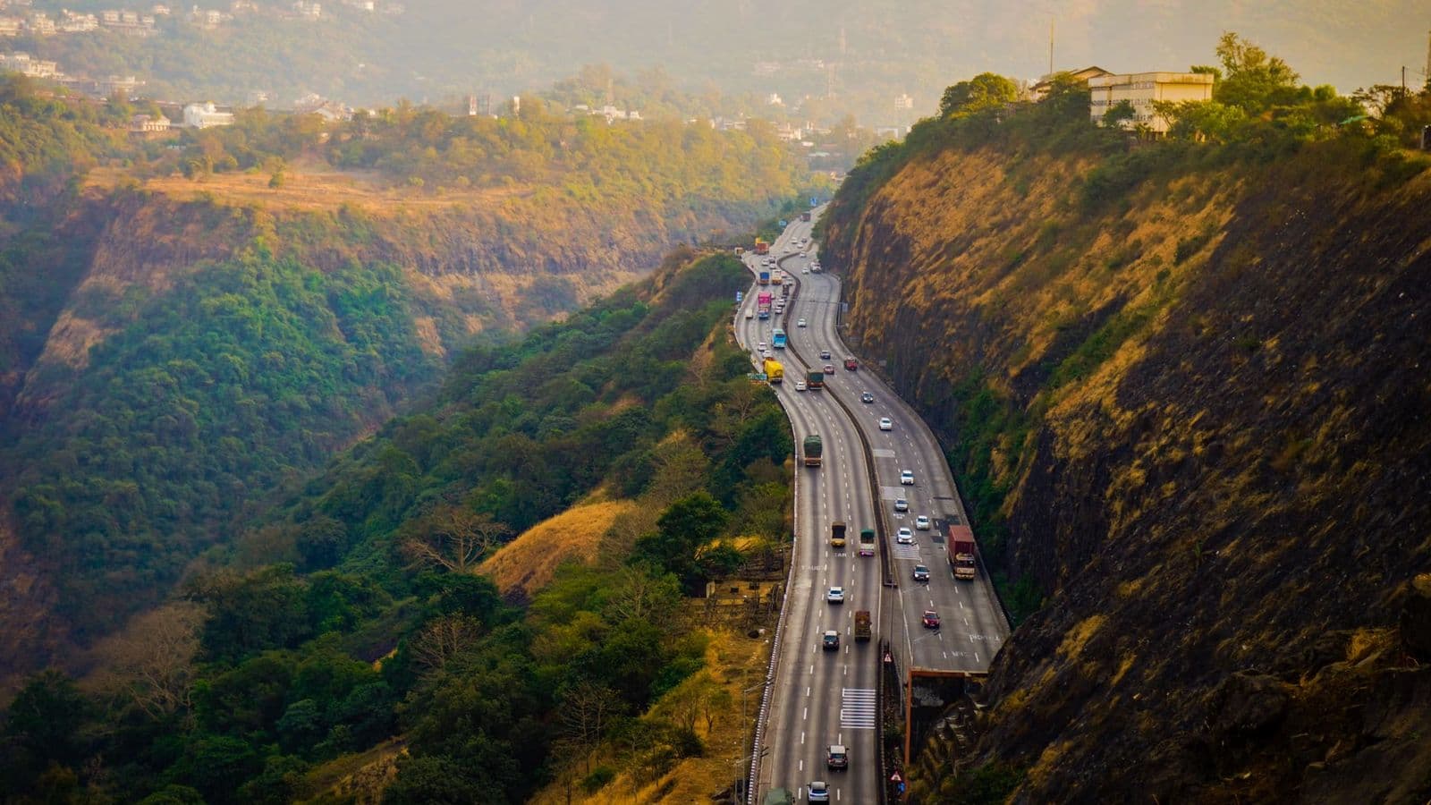 An open highway heading out of Bengaluru on an outstation trip