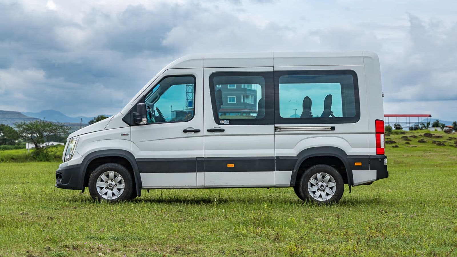 A high-roof luxury van of the class supplied for offsites and premium group travel